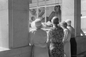 photographer unknown - Four women watching Diego Rivera at working on the Detroit Industry murals at the DIA, 1932