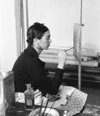 photographer unknown - Frida Kahlo seated at an easel, November 30, 1932